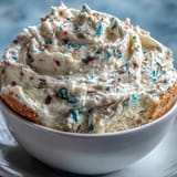 Generously decorated Spring Birthday Party Funfetti Dip Cake, ready to slice for celebrations.